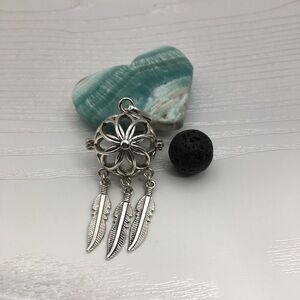 Dreamcatcher Aromatherapy Silver tone Locket.  Lava stone included.